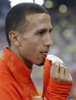 Olympic champion Ramzi stripped of gold medal