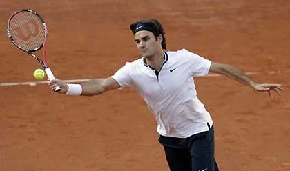 Federer gets rare doubles win at Rome Masters