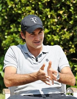 Federer gets rare doubles win at Rome Masters