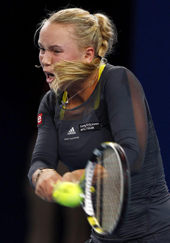 Djokovic, Wozniacki crowned in Beijing