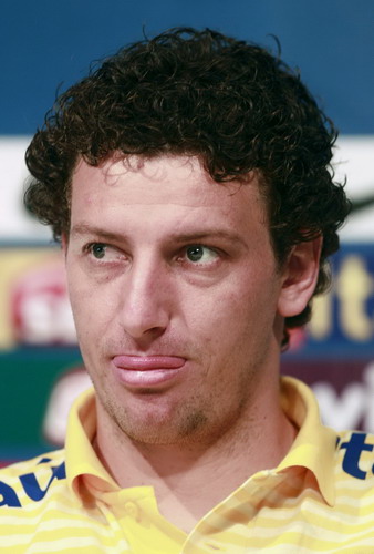 Brazilian soccer player Elano attends a news conference in Los Cardales, June 24, 2011. Elano threatens to leave Santos