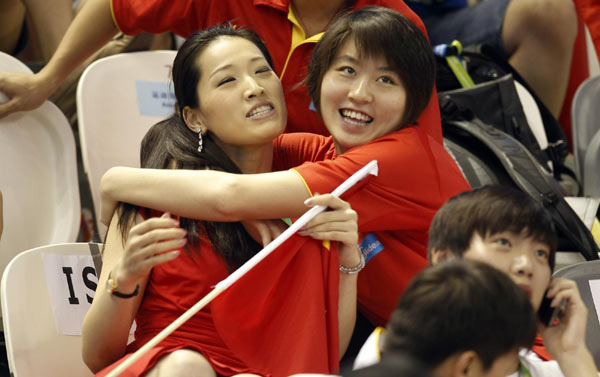 China's 'breaststroke queen' has a heart for swimming