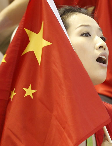 China's 'breaststroke queen' has a heart for swimming