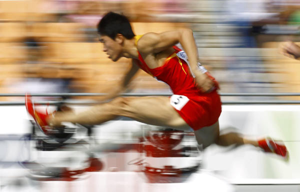 Liu Xiang impresses as top hurdlers ease through Liu Xiang impresses as top hurdlers ease through