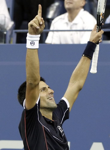 Novak Djokovic of Serbia celebrates his win over Carlos Berlocq of Argentina during their match at the US Open tennis tournament in New York Sept 1, 2011. Djokovic romps past Berlocq in US Open 2nd round