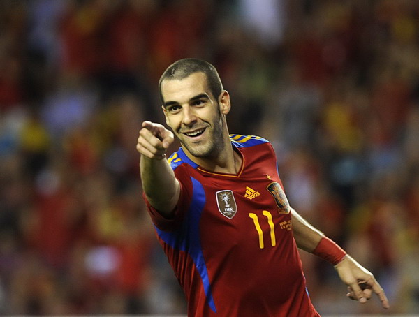 Spain's Alvaro Negredo celebrates after scoring his second goal against Liechtenstein during their Euro 2012 Group I qualifying soccer match at the Las Gaunas stadium in Logrono, northern Spain, Sept 6, 2011. Spain qualify for Euro 2012 with easy win