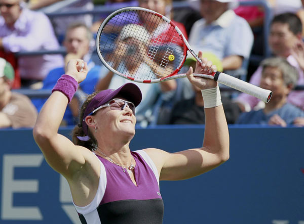 Wozniacki sets up semis against Serena, Stossur advances Wozniacki sets up semis against Serena