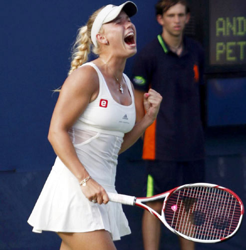 Wozniacki sets up semis against Serena, Stossur advances Wozniacki sets up semis against Serena