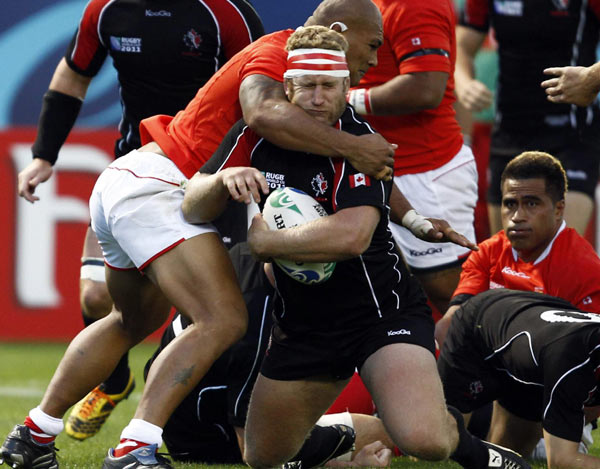 Canada stuns Tonga by late Mackenzie try Canada stuns Tonga by late Mackenzie try