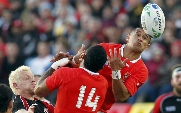 Canada stuns Tonga by late Mackenzie try Canada stuns Tonga by late Mackenzie try