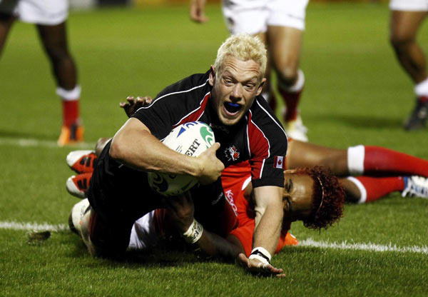 Canada stuns Tonga by late Mackenzie try Canada stuns Tonga by late Mackenzie try