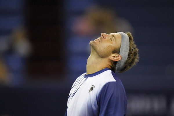 Mardy Fish of the US reacts during his match against Bernard Tomic of Australia at the Shanghai Masters tennis tournament Oct 11, 2011. Roddick turns tide in Shanghai but Fish flounders