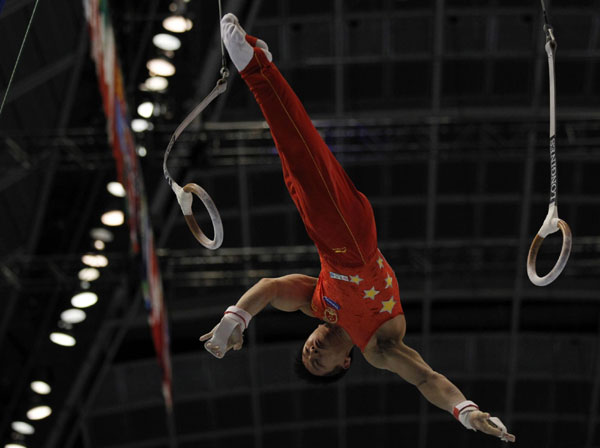 China's Chen Yibing competes on the rings during men's apparatus final at the Artistic Gymnastics World Championships in Tokyo October 15, 2011. Chen wins rings title at gymnastics worlds