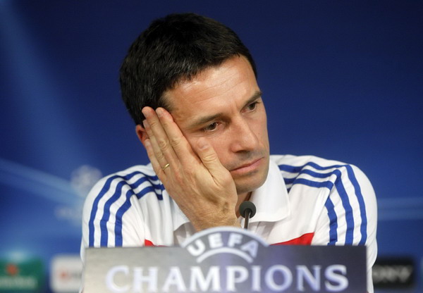 Olympique Lyon's coach Remi Garde reacts during a news conference ahead of their Champions League match against Real Madrid at Real Madrid's Santiago Bernabeu stadium Oct 17, 2011. Lyon ready to climb a Real-sized mountain: coach