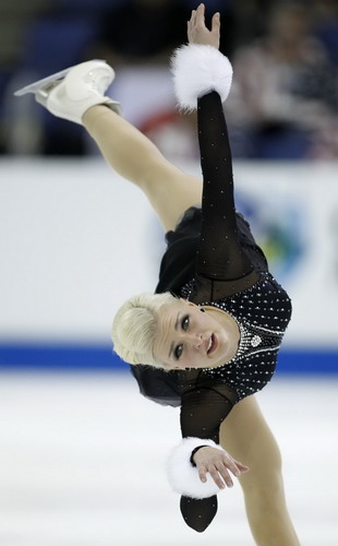 Viktoria Helgesson (R) of Sweden performs during the ladies free skating program on her way to placing third in the ladies competition at the Skate America ISU Grand Prix of Figure Skating in Ontario, California Oct 23, 2011. Chinese skaters win silver at ISU Grand Prix