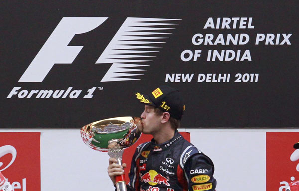 Red Bull's unstoppable double world champion Sebastian Vettel ran away with the inaugural Indian Formula One Grand Prix on Sunday for his 11th victory in 17 races this season. Vettel cruises to victory in India