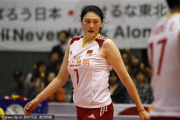 Chinese player Wang Yimei reacts during the match against hosts Japan in Hiroshima, Nov 6, 2011. China beats Japan at women's volleyball world cup