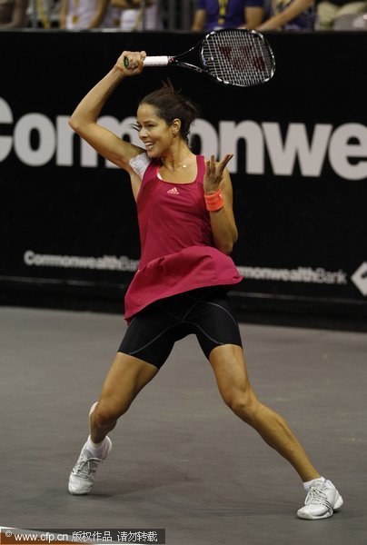 Ana Ivanovic of Serbia returns the ball during the final tennis match against Anabel Medina Garrigues of Spain at the Bali Tournament of Champions in Nusa Dua, Bali, Indonesia, sunday, Nov 6, 2011. Ivanovic celebrates birthday with Bali high