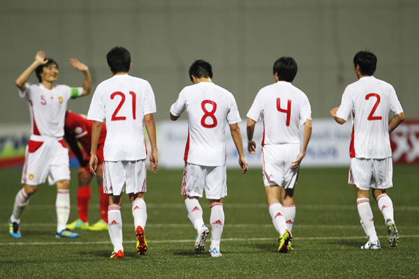 Former Asian champion Iraq's two goals ended China's slim hopes of advancing despite a crushing 4-0 away win over Singapore in the fifth round of the World Cup Asian zone qualifiers on Tuesday. China bids farewell to world cup despite a 4-0 win