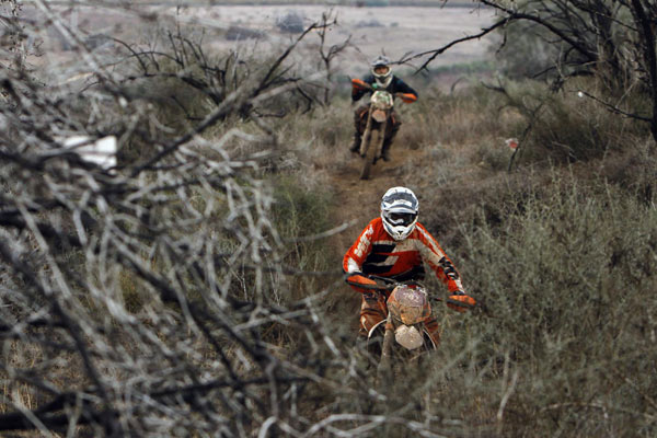 A motocross rider competes during the Israel's Enduro Championship 2012 near Kibbutz Negba in southern Israel. Enduro Championship 2012