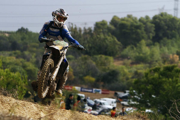 A motocross rider competes during the Israel's Enduro Championship 2012 near Kibbutz Negba in southern Israel. Enduro Championship 2012