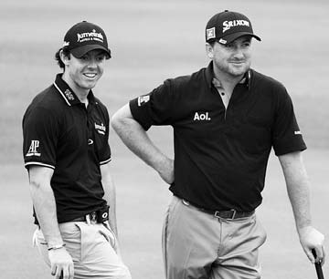 Irish dynamos Rory McIlroy and Graeme McDowell carded a second-round four-under 68 at the $7.5 million World Cup to ease into tied first place with pacesetters Australia. Irishmen share Cup lead with the Aussies