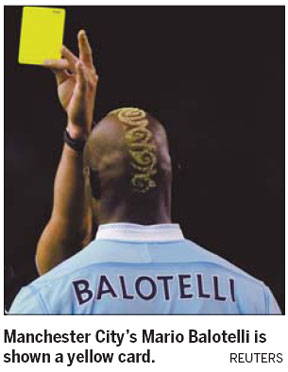 Manchester City manager Roberto Mancini accused Liverpool's players of getting Mario Balotelli sent off as the Premier League leaders were held to a 1-1 draw at Anfield. Mancini says Liverpool played cards a bit too well