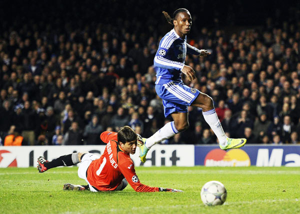 Two goals from Didier Drogba steered Chelsea to an emphatic 3-0 victory over Valencia and top spot in Group E as they moved into the Champions League knockout phase for the ninth consecutive season. Inspired Drogba leads Chelsea into last 16