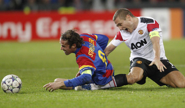 Sir Alex Ferguson's disappointment was compounded by a knee injury sustained by captain Nemanja Vidic that saw him stretchered off shortly before halftime. Vidic injury adds to misery