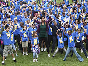 US first lady Michelle Obama sets the record to lead most people doing jumping jacks in a 24-hour period. US first lady sets world record for jumping jacks