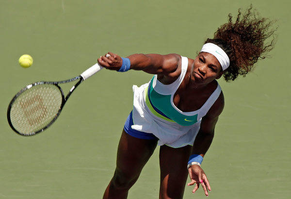Serena Williams of the US serves to Maria Sharapova of Russia during the women's final at the Sony Open tennis tournament in Key Biscayne, Florida March 30, 2013. Serena beats Sharapova in Sony Open final