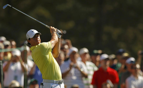 Rory McIlroy of Northern Ireland watches his tee shot on the 12th hole during a practice round in preparation for the 2013 Masters golf tournament at the Augusta National Golf Club in Augusta, Georgia, April 10, 2013. Maturing McIlroy calls talk of rivalry with Woods premature