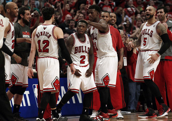 Robinson sparks Bulls to 3OT win over Nets