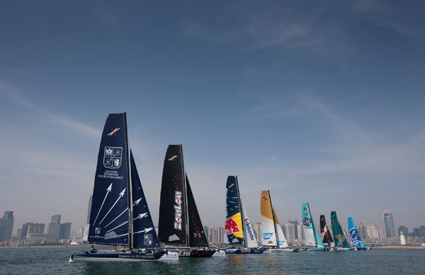 Sail boats take to the water during the 2012 Extreme Sailing Series in Qingdao. This year's event will be held at the Qingdao International Sailing Center from Thursday through Sunday. Provided to China Daily New culture on high seas