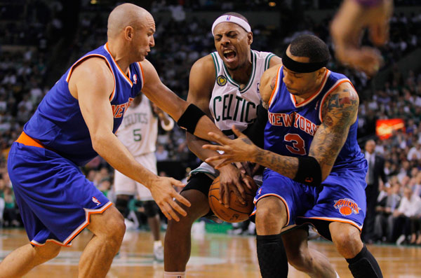 Boston Celtics Paul Pierce (center) competes for the ball with New York Knicks Jason Kidd (left) and Kenyon Martin during the Game 4 of their NBA Eastern Conference first-roud playoff series in Boston, Massachusetts, on Sunday. The Celtics won 97-90 to avoid first round sweep. Jessica Rinaldi / Reuters Celts avoid playoff sweep