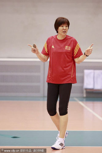 Lang Ping reacts during the first public training of the Chinese national women's volleyball team since she tokk office in Beijing, on May 10, 2013. First training after Lang Ping takes rein
