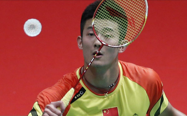 China's Chen Long plays a shot during his singles match against Indonesia's Tommy Sugiarto at the quarterfinals of the Sudirman Cup World Team Badminton Championships in Kuala Lumpur, May 23, 2013. China edges through Indonesia to for Sudirman semifinals