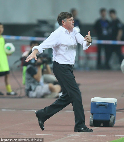 Head coach of Chinese national team Camacha reacts during China's 1-5 loss to Thailand during an international friendly in Hefei, Anhui province, June 15, 2013. Soccer national team concedes humiliating defeat