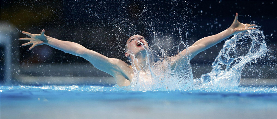 Gold medallist Russia's Svetlana Romashina performs in the synchronised swimming solo free final during the World Swimming Championships at the Sant Jordi arena in Barcelona, July 24, 2013. Russia gets gold in solo free routine of synchronized swimming