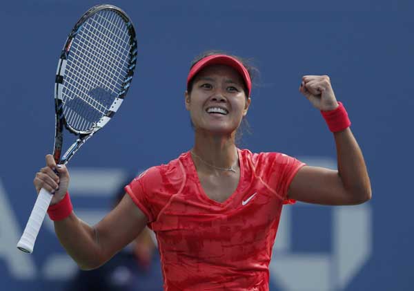 Li Na of China celebrates after defeating Ekaterina Makarova of Russia at the US Open tennis championships in New York, Sept 3, 2013. Li Na becomes China's first US Open semifinalist