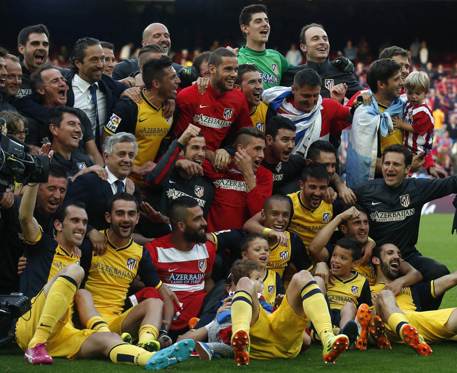 Atletico wins Spanish title with 1-1 draw at Barca