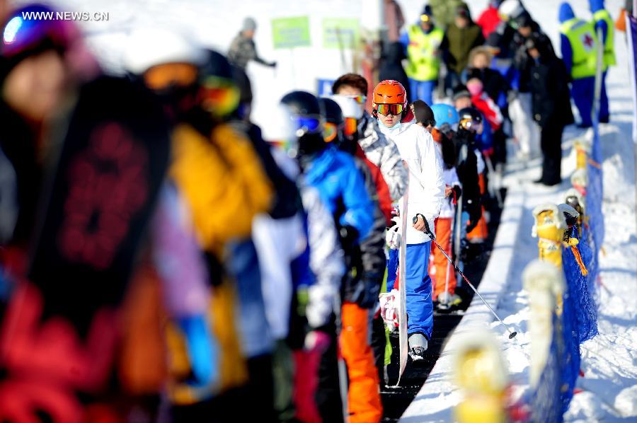 Tourists ski in China's Shenyang