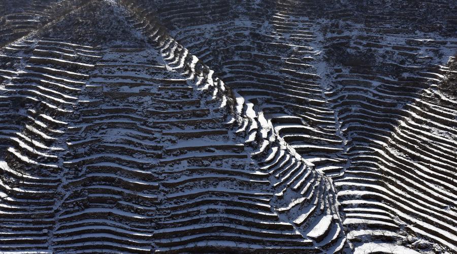 Scenery of terraced fields after snow in Hebei