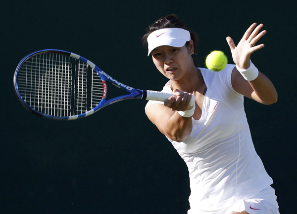 溫網(wǎng)：“中國金花”李娜、鄭潔晉級次輪