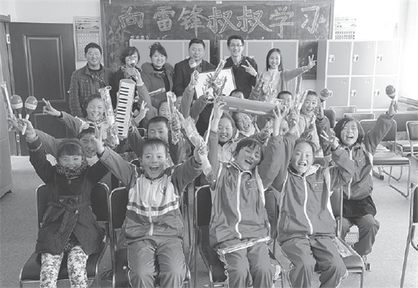 With charity project, music teacher hits the right note