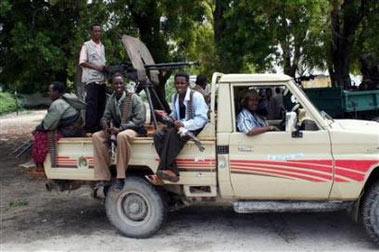 Members of the anti-terrorism warlord coalition that has been battling forces loyal to Islamic courts are seen in Balad, a strategic town, about 19 miles north of Mogadishu June 4, 2006.