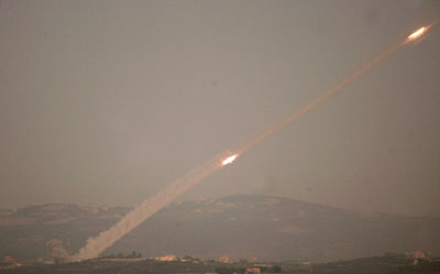 Hizbollah missiles streak the sky as they are launched towards Israel from south Lebanon August 6, 2006.