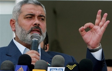Palestinian Authority Prime Minister Ismail Haniyeh of the Islamic group Hamas speaks to Hamas supporters during a rally in front of his office in Gaza City Wednesday Sept. 20, 2006. (AP