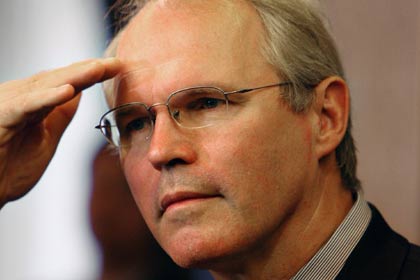 U.S. Assistant Secretary of State Christopher Hill gestures during a news conference in Shanghai September 11, 2006