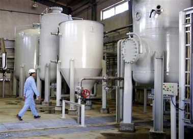 An Interior view of the Arak heavy water production facility in Central Iran, 360 km (223 miles) southwest of Tehran, October 27, 2004. Most Western and developing nations in the U.N. nuclear watchdog tentatively agreed on Wednesday to shelve Iran's request for help with its Arak reactor over fears it could yield bomb-grade plutonium, diplomats said.